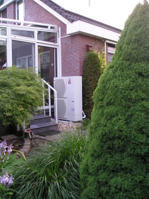 The Air/Water Heatpump located next to the House